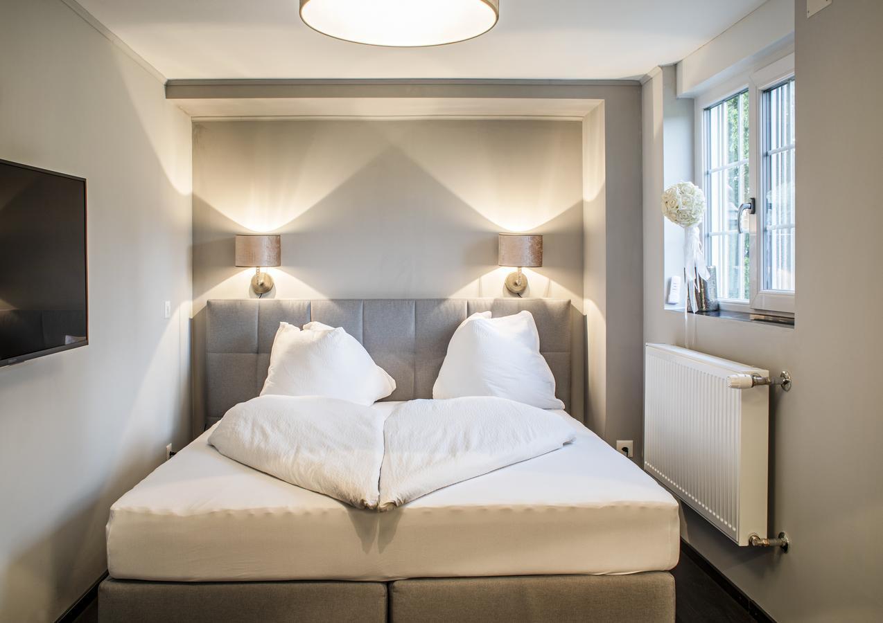 Landcafe Mit Mini Hotel Burgdorf Bagian luar foto